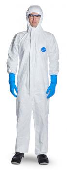 In the picture, there is a person in a white hooded protective suit. They are wearing blue gloves and safety goggles. The person appears professional and protected.