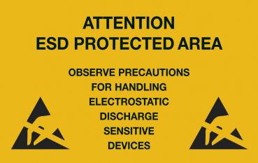 The image shows a yellow warning sign with black text. It warns about an area that protects against electrostatic discharge. There are also symbols indicating caution.