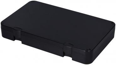 The image shows a rectangular, black plastic box with smooth surfaces and flattened edges. The box has two small clasps on the long sides.