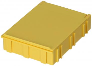 Das Bild zeigt eine gelbe, rechteckige Box mit einem flachen Deckel. Die Kanten sind leicht erhöht und die Fläche hat eine glatte Textur. Sie kann zum Verstauen verwendet werden.