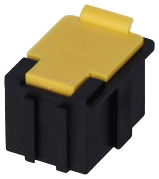 The image shows a small electric plug that is primarily black with a yellow top. It has a rectangular shape with a flat cover and a recess for plugging in.