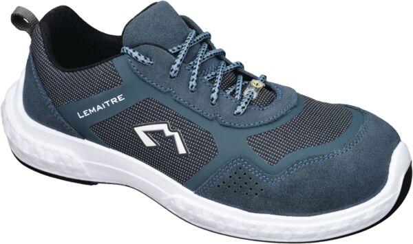 The shoe is a dark blue, mid-top sneaker with gray and white accents. It has a textured surface, flat laces, and a thick white sole for good comfort.