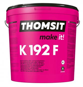 In the picture is a pink paint bucket with the imprint "THOMSIT make it! K 192 F". The bucket has a black lid, and the lettering is in white and black.