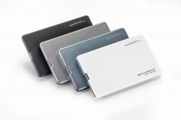 Four flat, rectangular devices in various colors: black, gray, blue, and white. They have a smooth surface and are stackable. The front displays the inscription "MICROSD".