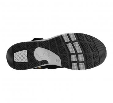 The image shows the underside of a shoe. The sole is black with light gray and white grooves and patterns that provide better grip. It appears sturdy and functional.