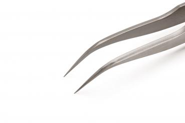 The image shows a sharp, metallic tweezer. The edges are narrow and taper into two fine, pointed tips suitable for grasping small objects.
