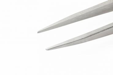 The image shows a narrow, shiny tweezer with pointed tips. The background is light and solid, making the tweezer stand out clearly.