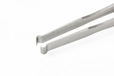 The image shows a metallic tweezer with two long, narrow arms that are slightly bent outward at one end. The surface is shiny and smooth.