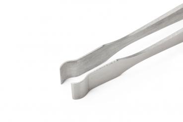 The image shows a metallic pair of tongs with two long, flat arms. The ends are bent to facilitate gripping objects. The material appears sturdy and simple.