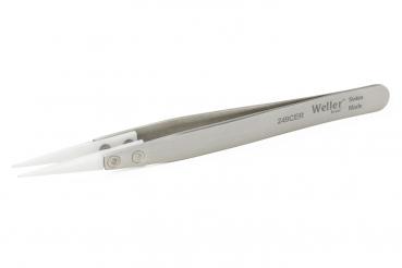 In the image, a stainless steel tweezer is visible. It features narrow, pointed tips and a gray handle with the inscription "Weller". The surface is smooth and shiny.