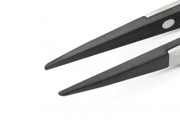 The image shows the tips of a pair of scissors. The blades are narrow and pointed, with a shiny silver surface and a matte, black coating on the edges.