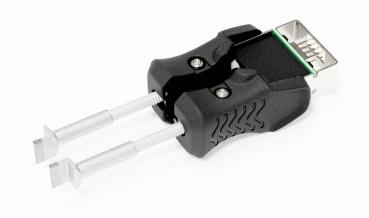 The image shows an adapter with two gripping handles and a USB port. The handles are made of black plastic, while the two ends are metallic and function like clamps.