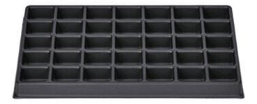 The image shows a dark, rectangular shape with several small, square indentations. These are arranged in uniform rows and columns, totaling 36 compartments.