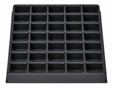 The image shows a rectangular, black baking pan with 36 evenly distributed, small indentations suitable for muffins or cupcakes. The surface is smooth.