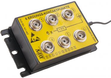 The image displays a rectangular, black box with a yellow lid. On the lid, six round grounding contact points are embossed, next to which is written "6 GROUNDING CONTACT POINTS". A cable leads away from it.