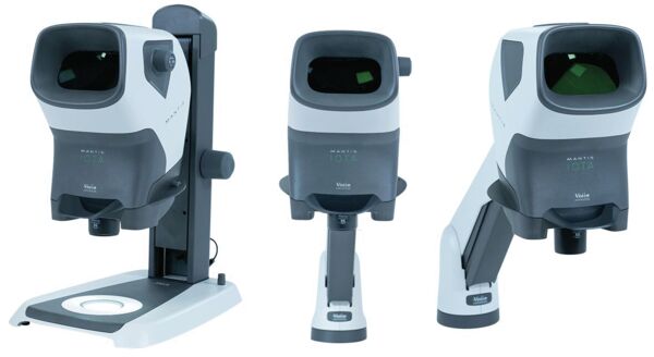 The image shows an electronic visual aid device. It has a curved, modern shape in white and gray, with a large field of view. The front has an opening through which one looks.