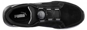 The shoe is black with a smooth surface and reinforced upper. It has round lacing with a special closure and a comfortable, profiled sole.