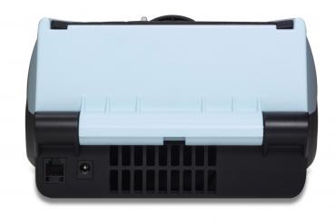 The image displays a compact device in black and blue. The top is light blue with two grooves. On the bottom, ventilation slots and a connector socket are visible.