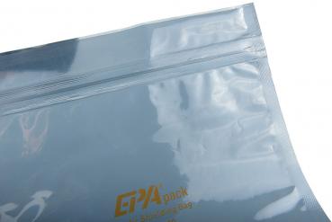The image shows a transparent, folded plastic bag with a smooth surface and a yellow print. The bag has a zipper on top.