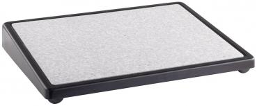 The image shows a rectangular platform with a gray, textured surface and a black frame. It has rounded corners and is supported by four small feet.