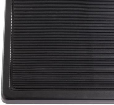 The image shows a black rubber mat with a ridged pattern. The ridges are evenly arranged and the mat has rounded corners. It is functional and durable.
