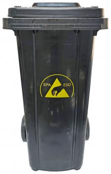 The image shows a black trash can with two wheels. On the front, there is a yellow symbol featuring two mountains and the inscription "EPA ESD", indicating hazardous waste.