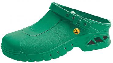 The image shows a green plastic clog shoe. It has a closed front, an adjustable strap at the heel, and ventilation slots on the sides.