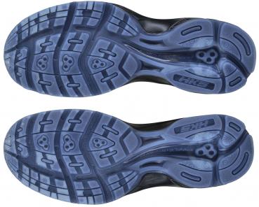 The image displays the sole of a sports shoe. It is black with blue and gray rubber tread elements that provide the shoe with grip and stability. Various cleats and patterns are visible.