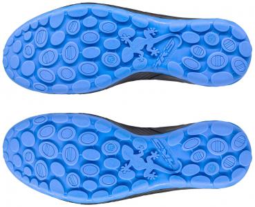The image shows the sole of shoes with a blue rubber sole. The surface is equipped with various oval and round protrusions that provide good grip.