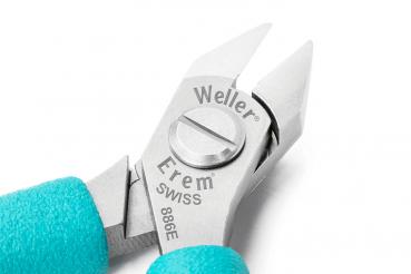 The image displays a high-quality pair of pliers with two sharp, pointed metal blades. The handle is coated with a blue rubber surface. Brand names are embossed on the pliers.