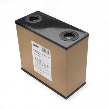 The image shows a rectangular, brown cardboard box with a black top. There are two round openings on top and a sticker with information on the side.