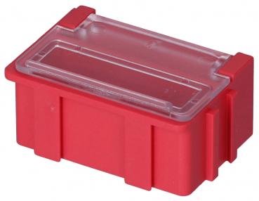 Das Bild zeigt eine rote Kunststoffbox mit einem transparenten Deckel. Sie hat eine rechteckige Form und vertikale Rillen an den Seiten für besseren Halt.