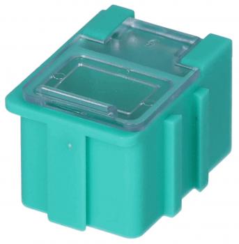 Auf dem Bild ist ein kleiner, quadratischer Block in leuchtendem Türkis. Er hat eine durchsichtige Oberseite und seitliche Erhebungen, die ihm Halt geben.