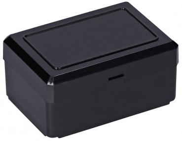 Es handelt sich um eine rechteckige, schlichte, schwarze Box mit abgerundeten Ecken. Der Deckel ist flach und die Oberfläche ist glatt. Sie wirkt robust und neutral.