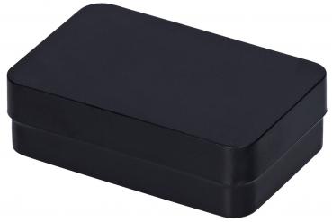 Das Bild zeigt eine rechteckige, matte schwarze Box mit abgerundeten Kanten. Sie hat einen flachen Deckel und wirkt schlicht und modern. Die Oberfläche ist einheitlich und ohne Muster.