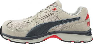 The shoe is a light, sporty sneaker. It has a light, gray upper made of textile and synthetic leather with a dark blue stripe. The sole is cushioning and has reddish accents.