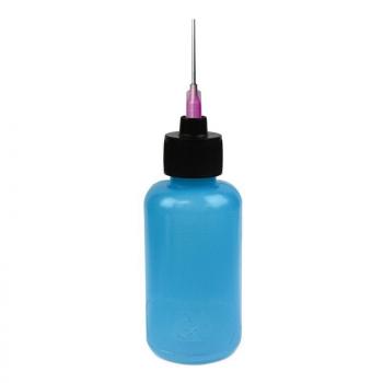 The image shows a transparent, light blue bottle with a black screw cap. At the top, a thin, silver metal pin with a purple tip protrudes.
