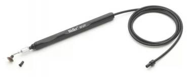 The image shows a black hand tool with a long handle and a smooth, round tip. A wire-like cable extends from the handle. Smaller parts are laid out next to it.
