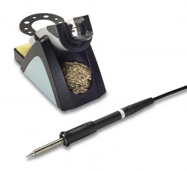 The image shows a soldering iron with a black handle and a blue ring. The tip is metallic and thin. A cable extends from the handle. The iron is used for soldering.
