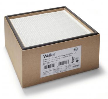 Das Bild zeigt eine quadratische Box aus kartonähnlichem Material. Oben ist ein Filter sichtbar, der eine strukturierte Oberfläche hat. Auf der Seite befindet sich ein Etikett mit technischen Informationen.