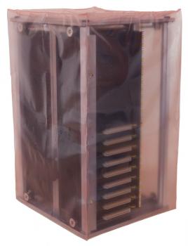The image shows a rectangular box with a transparent lid. Inside, there are several narrow, vertical elements arranged. The surface appears shiny and dark.