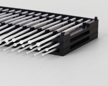 The image displays a black bracket with numerous vertically oriented, thin, white rods that are evenly spaced side by side. The rods are long and slender.