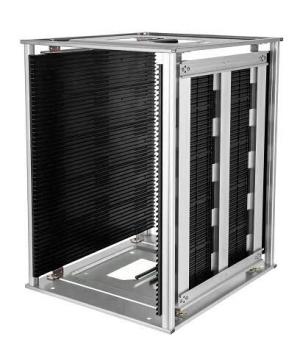 The image displays a rectangular structure made of aluminum with black slats on the sides. The slats are arranged vertically, creating a modern, technical look.