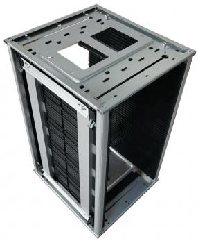 The image shows a computer case made of silver-colored metal. It has an open structure with vertical cooling slots and a compartment that provides space for components.