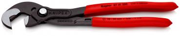 The image displays a pipe wrench with a black head and red, ergonomically shaped handles. The wrench features an adjustable opening for gripping pipes or objects.