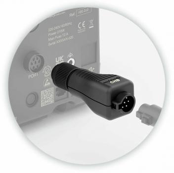 The image shows a black electric plug with a round socket and several contacts on the front. The plug has a ridged surface for better grip.