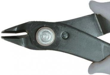 The image shows a pair of pliers in hand position. The pliers have a matte black surface and a round screw in the middle, while the tips taper to a point.