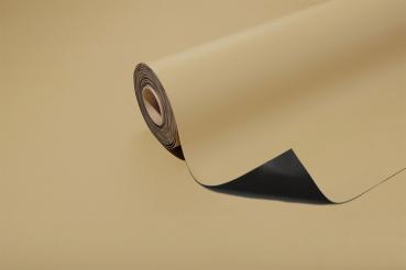 The image shows a roll of paper-like material in light beige, partially unrolled. The underside is black, and the edge of the paper is slightly wavy.