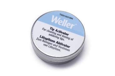 The image shows a small, round tin with a screw-on lid. On the surface, the name 