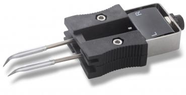 The image shows a device with two long, thin metal spikes protruding forward. The body is made of black plastic and has a silver metal base. At the top, there are buttons labeled with the letters 